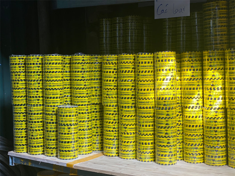 Mua băng dính logo hàng dễ vỡ lõi giấy 5mm tại Thungcartonchuyennha.net